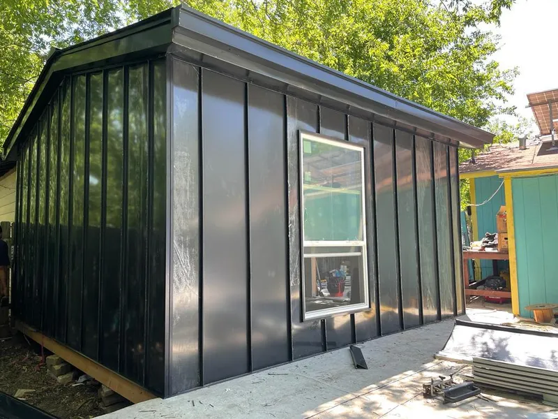 Black standing seam metal wall panels for Metal Roof Installation in Dickinson